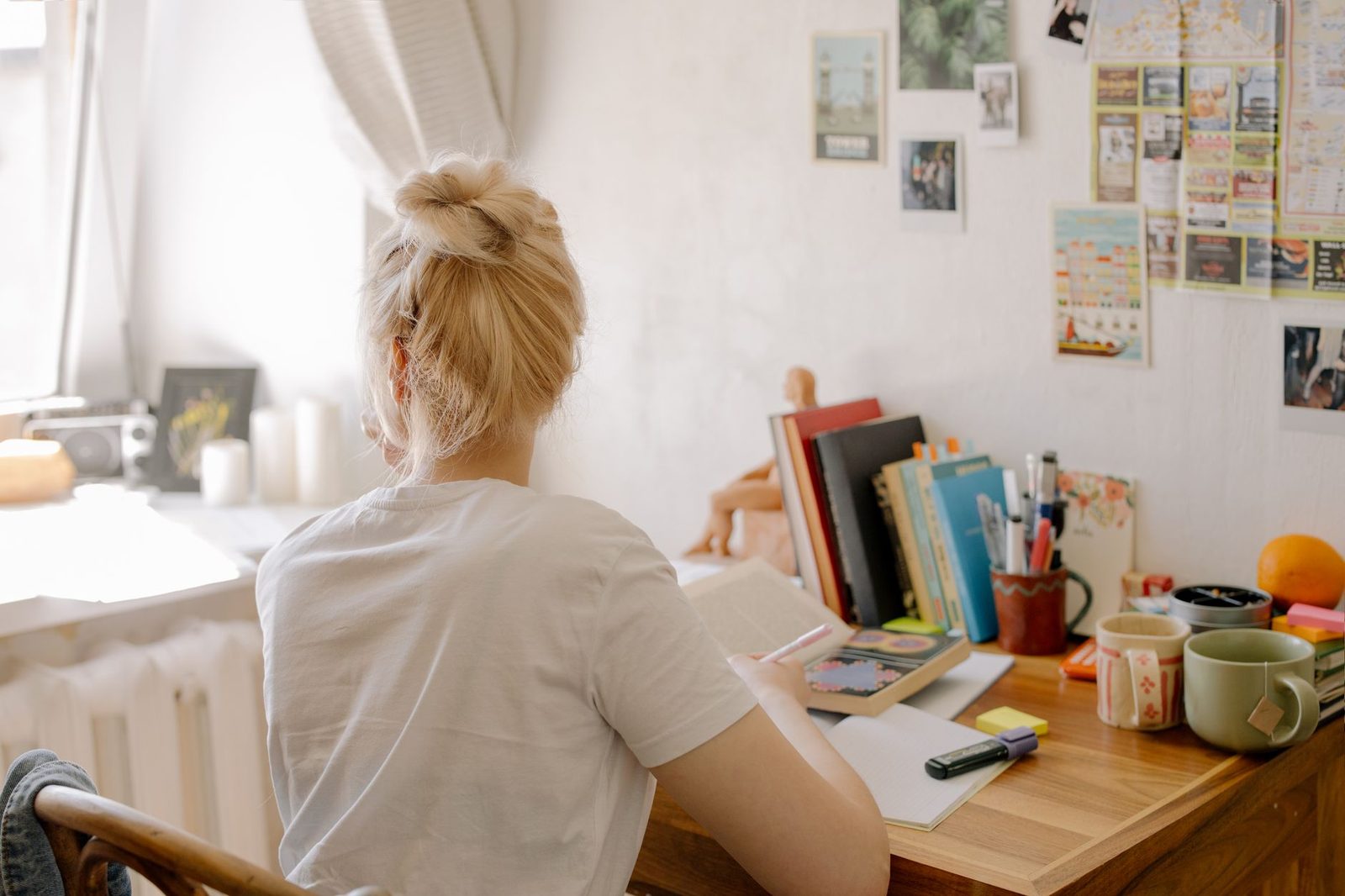 Student working at a desk preparing for standardized tests