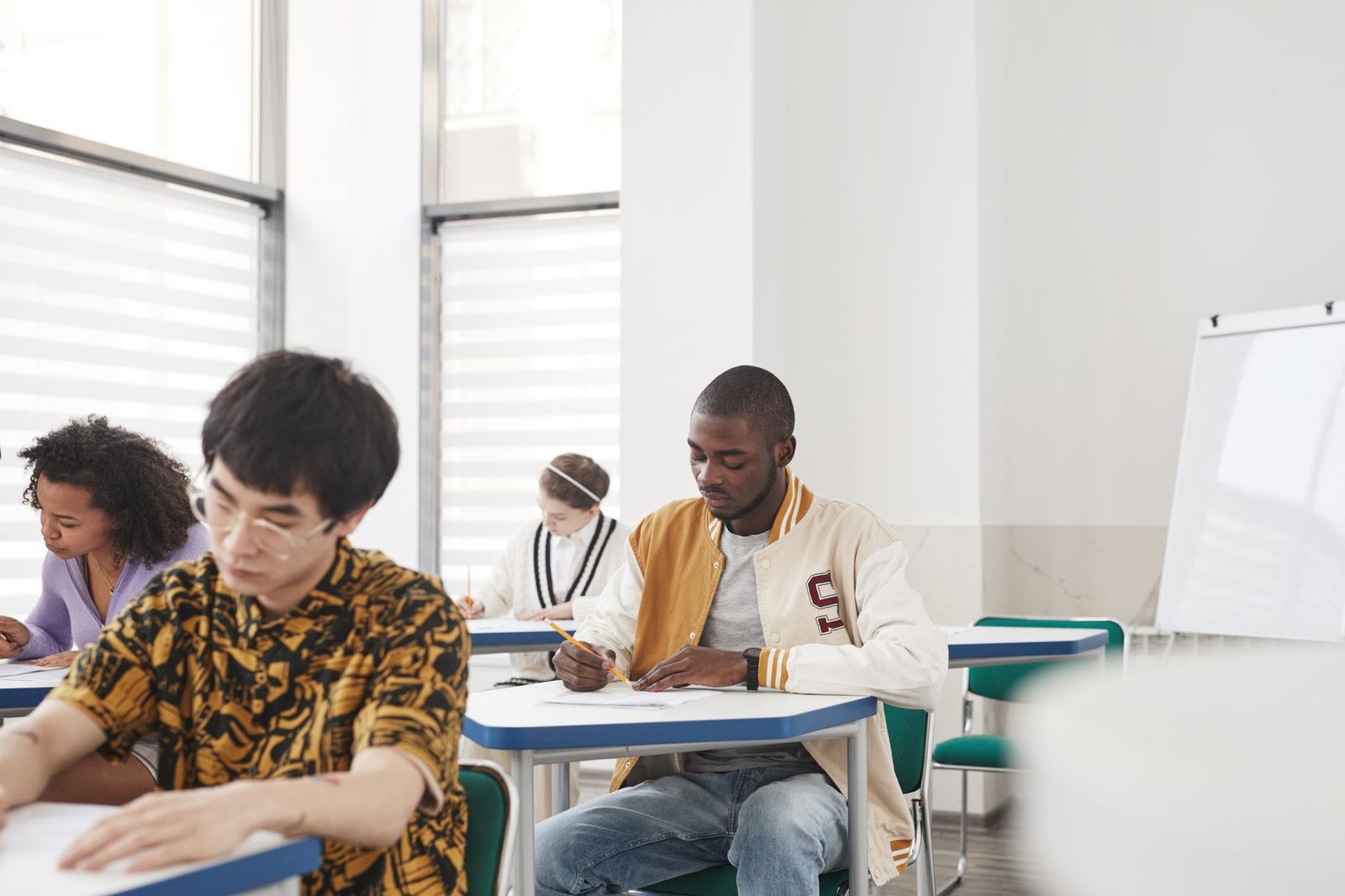 Student reviewing college scholarship applications on laptop