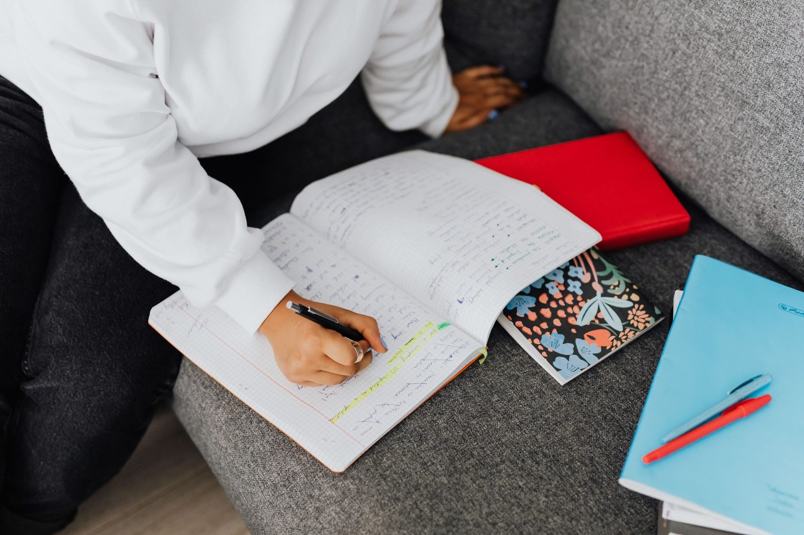 Student reviewing math formulas in a notebook